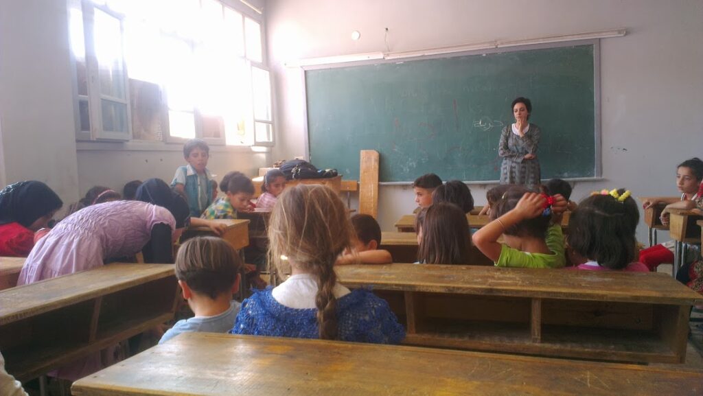 Razan Ghazzawi teaching during Karama Bus project
