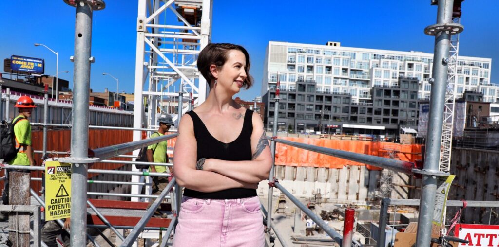 Leslie Kern standing on a construction site